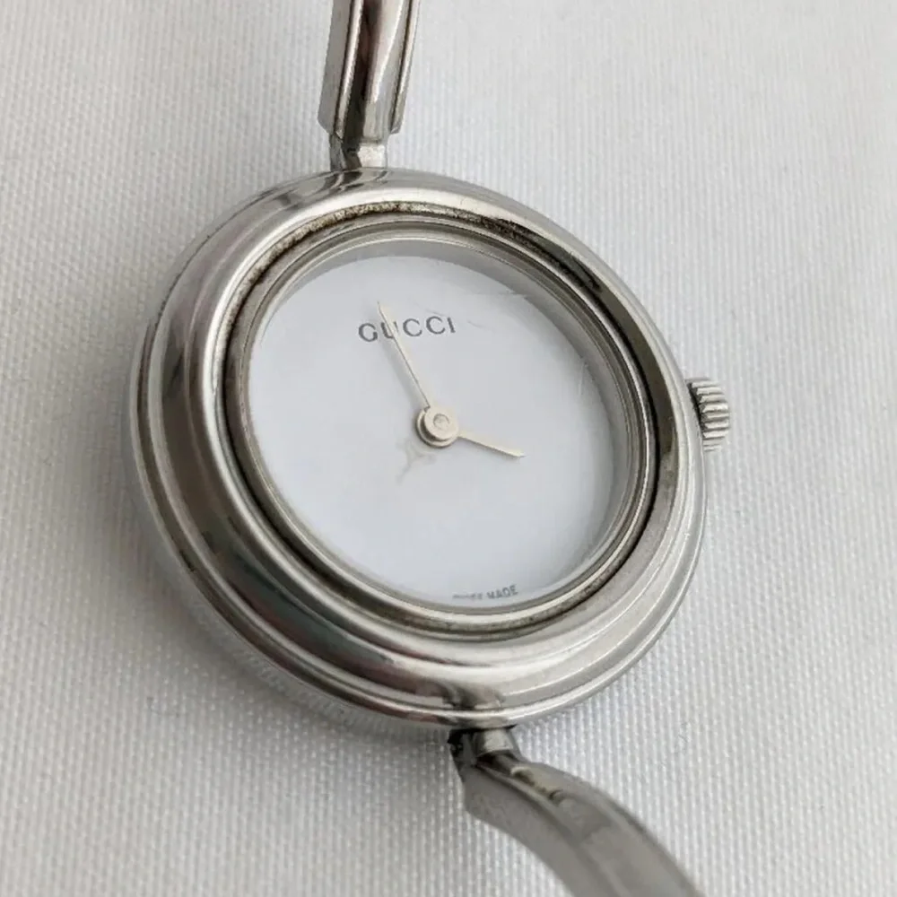 GUCCI Silver Italian Luxury Bracelet Watch with Bezels for changing